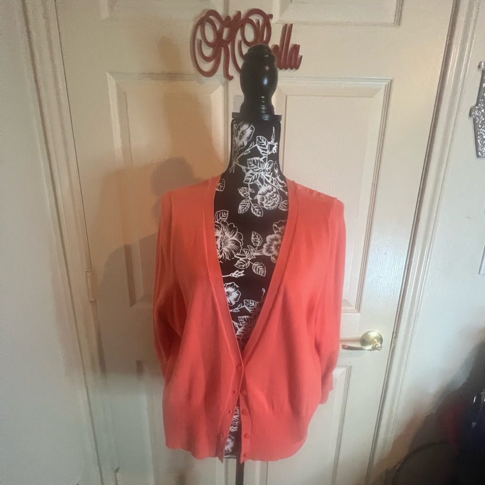 Well-loved 22/24 sherbet color cardigan type halter.